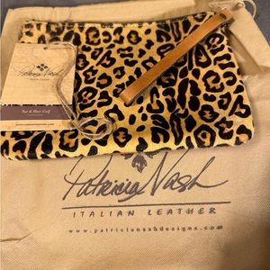 Patricia Nash with tags and dust bag!  Wristlet beautiful condition!  Like new